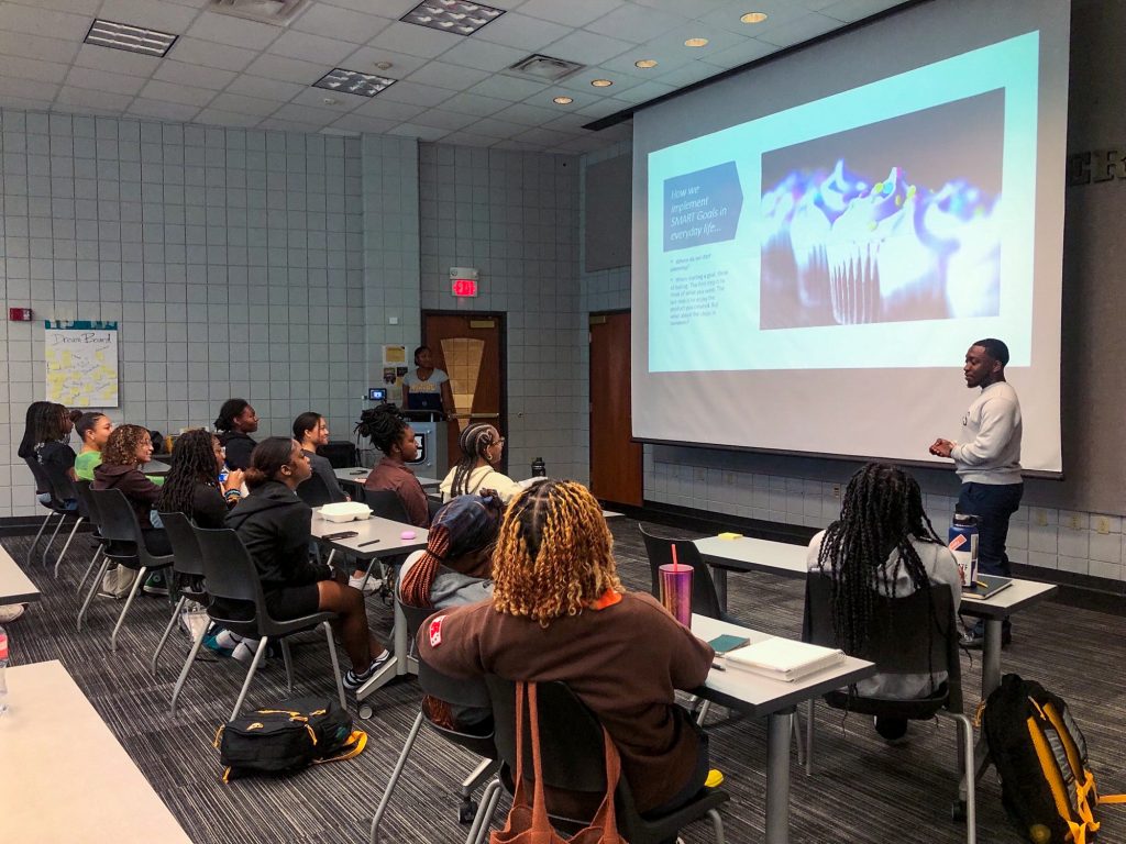 Student success coaches Kennedy Mitchum and Jae-Kur Lockhart presenting to Mizzou Black Women's Initiative