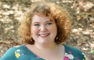 Headshot of Megan Murph, smiling