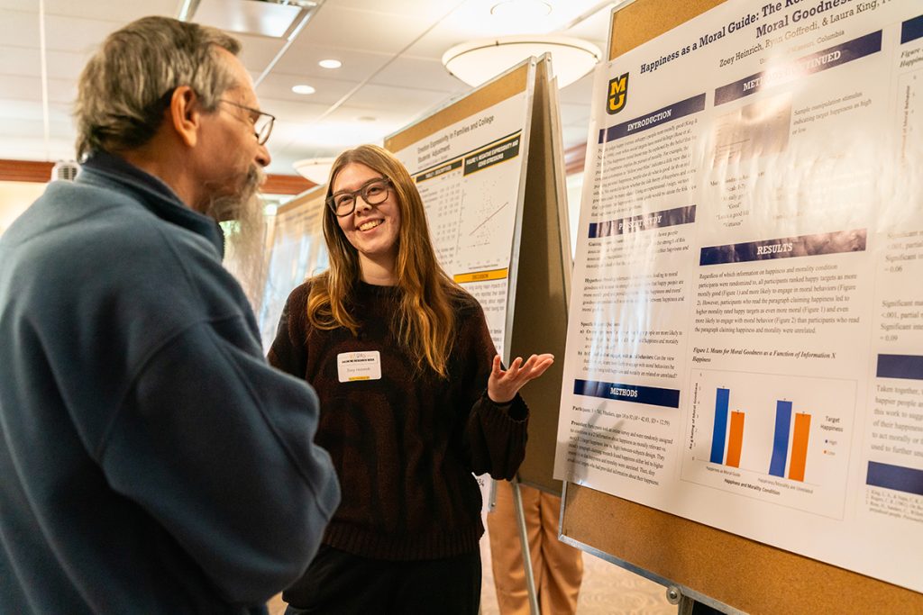 Student presenting her research at Show Me Research Week