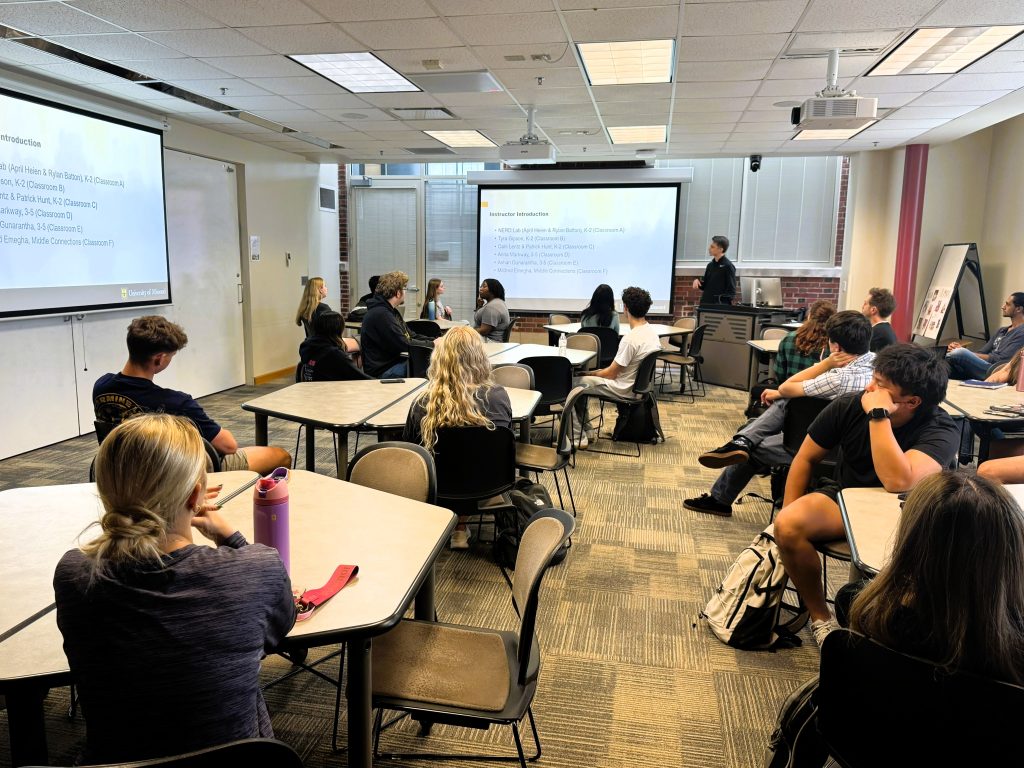 College students in a classroom for a training workshop