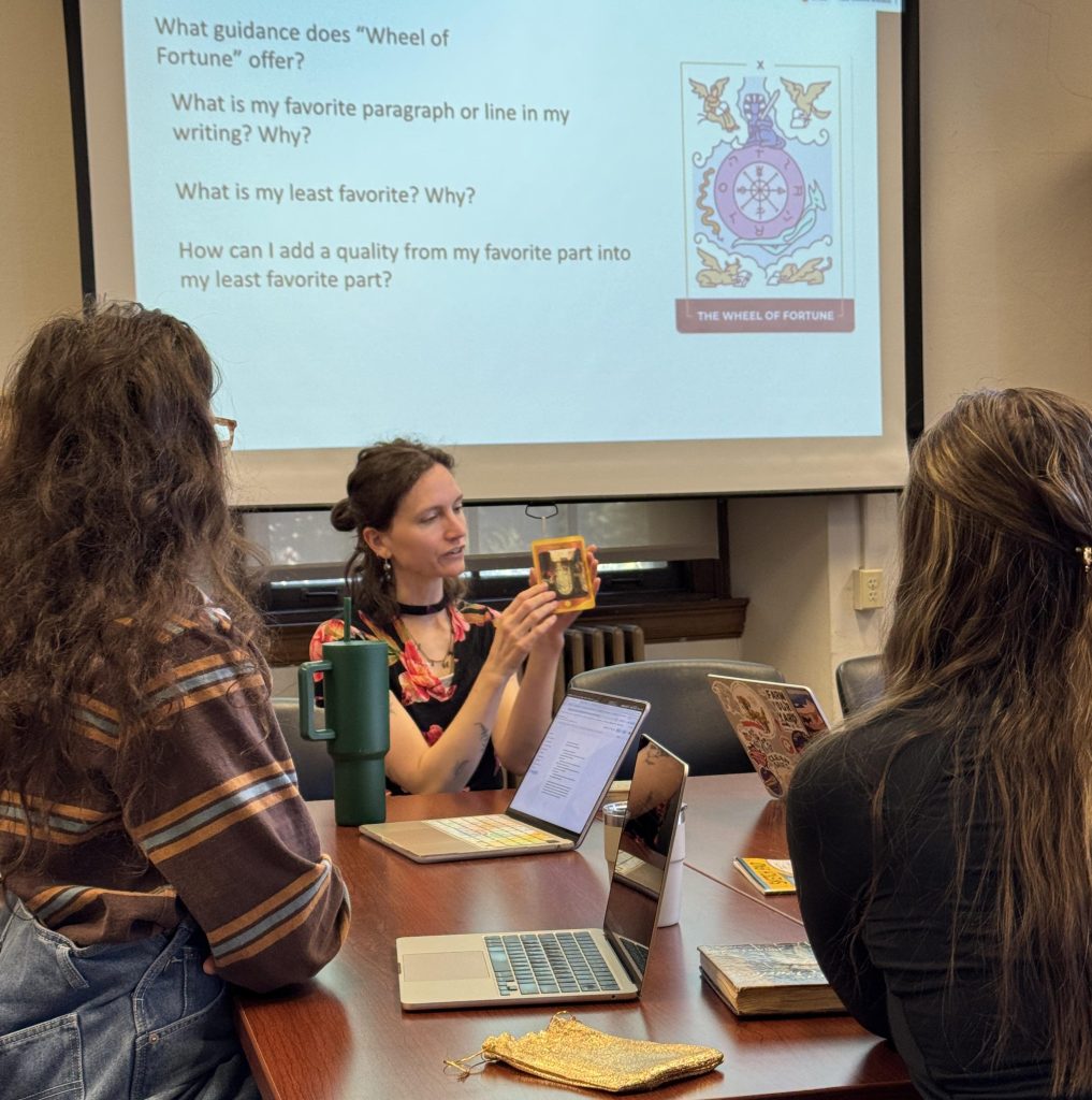  Julia Kooi Talen leads a group of grad students in a Tarot card reading