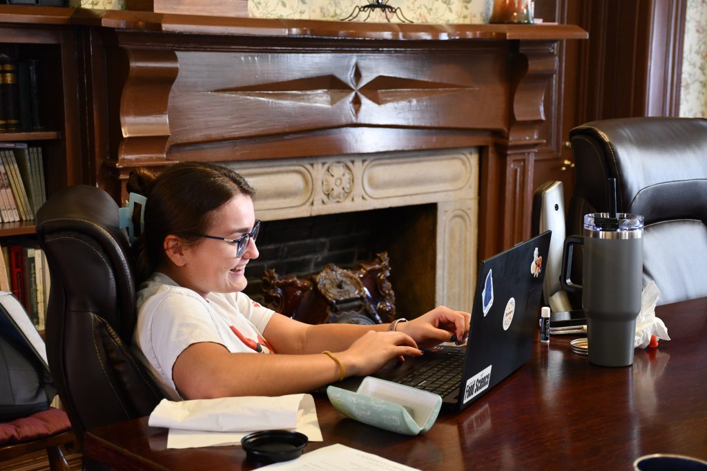 Graduate Students working on writing projects at a retreat at the Conley House, Oct. 20, 2026