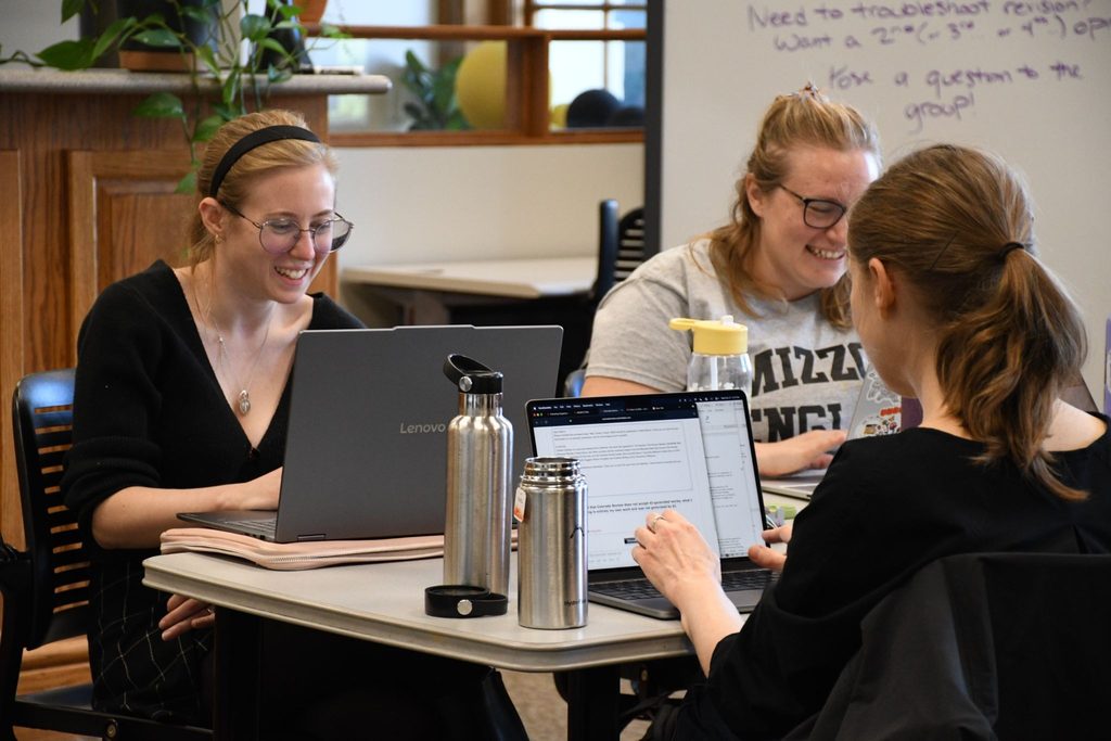 Grad students at a workshop during the Week of Writin g