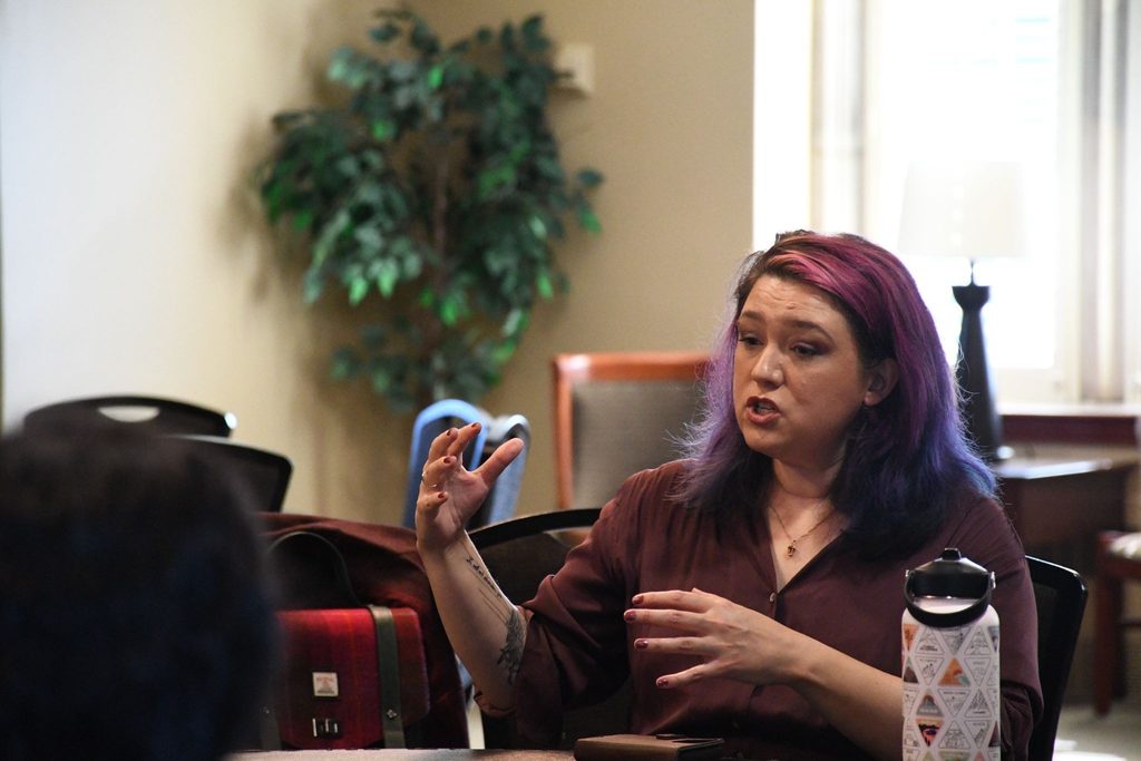 Emily Friedman talks about the writing process with grad students. 